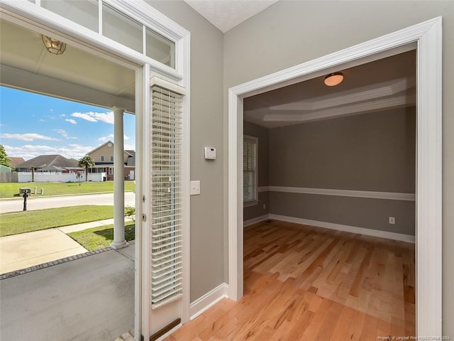 doorway featuring light hardwood / wood-style floors