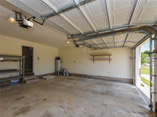 garage with gas water heater and a garage door opener