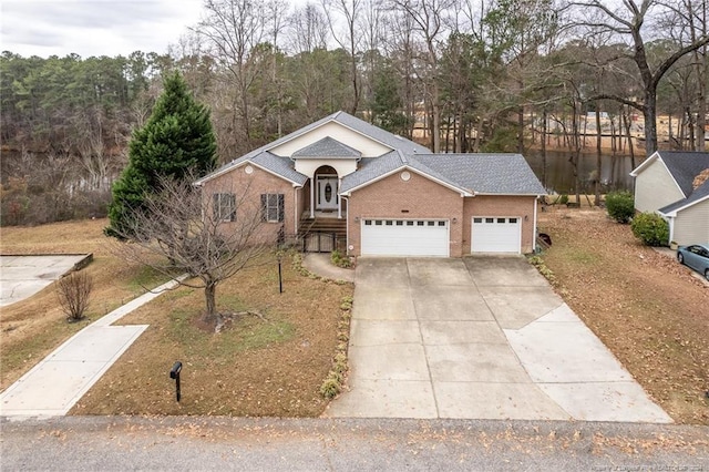 view of front facade featuring a front lawn and a garage