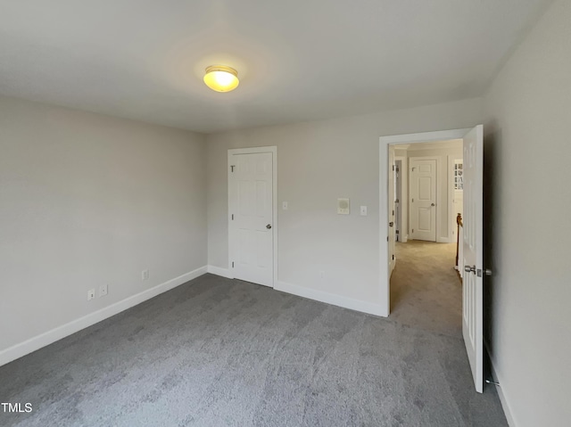 unfurnished bedroom featuring carpet