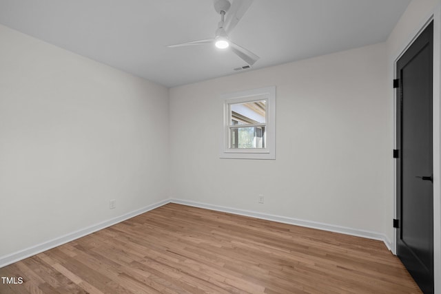 unfurnished room featuring light hardwood / wood-style floors and ceiling fan