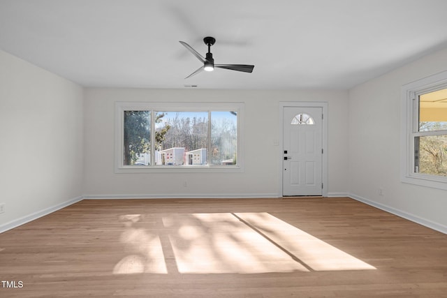 entryway featuring ceiling fan and light wood-type flooring