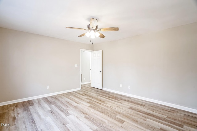 spare room featuring light wood-type flooring