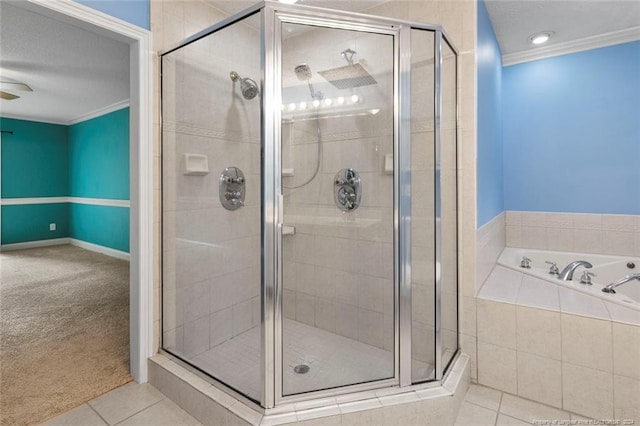 bathroom featuring tile patterned floors, ornamental molding, a textured ceiling, separate shower and tub, and ceiling fan