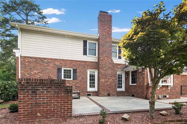 back of house with a patio area