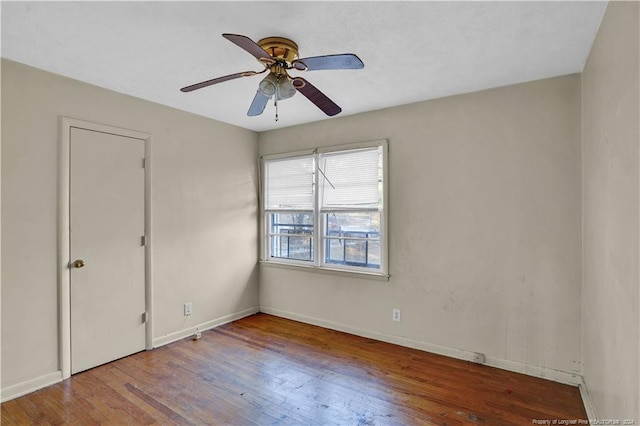 unfurnished bedroom featuring hardwood / wood-style flooring and ceiling fan