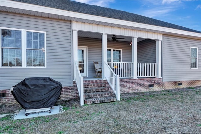 property entrance with a porch, crawl space, a shingled roof, and a ceiling fan