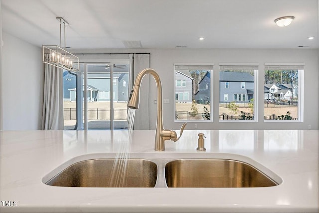 room details with sink and pendant lighting