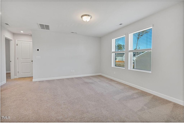 view of carpeted spare room