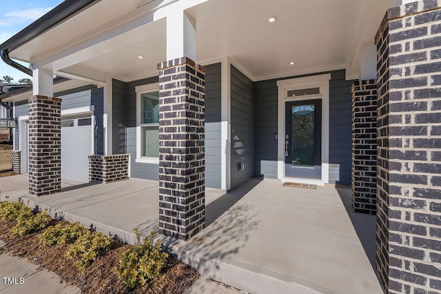 property entrance with a garage