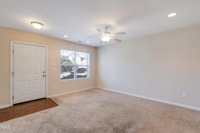 interior space featuring ceiling fan