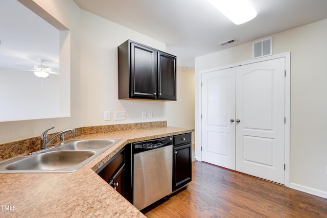 kitchen with ceiling fan, dishwasher, dark wood-type flooring, and sink