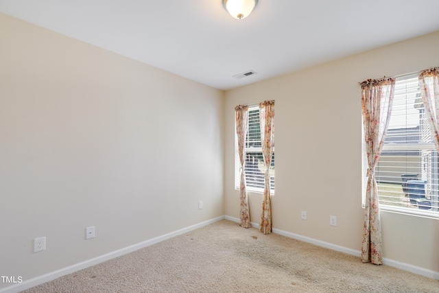 view of carpeted spare room