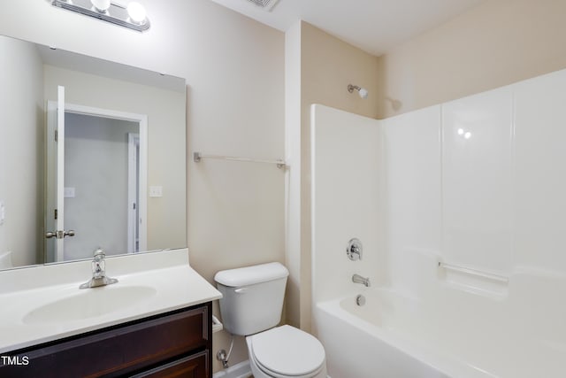 full bathroom with vanity,  shower combination, and toilet