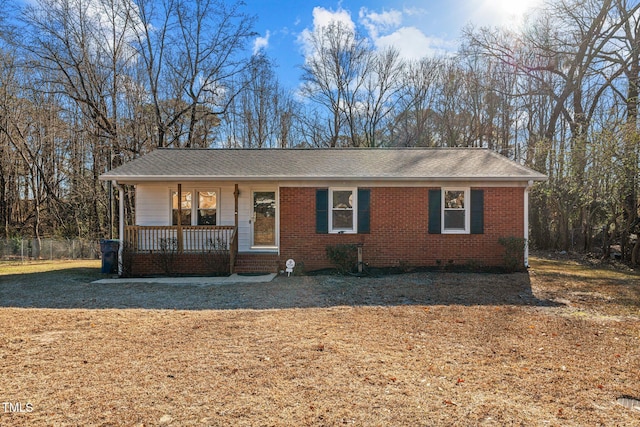 ranch-style house featuring covered porch