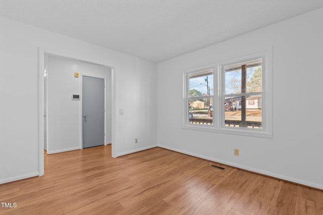 empty room featuring light wood-type flooring