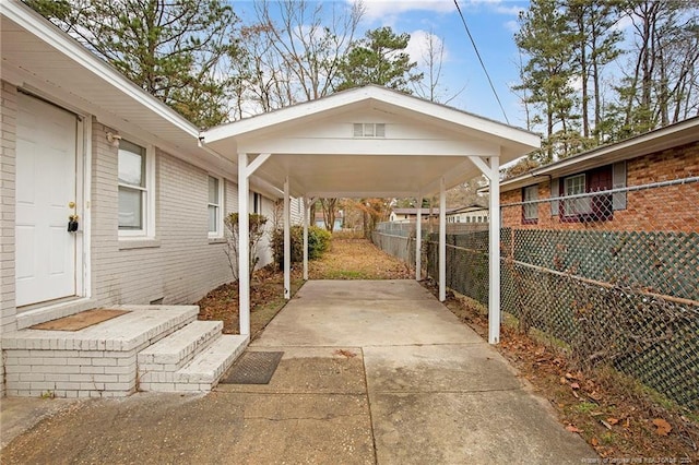 view of patio / terrace with a carport