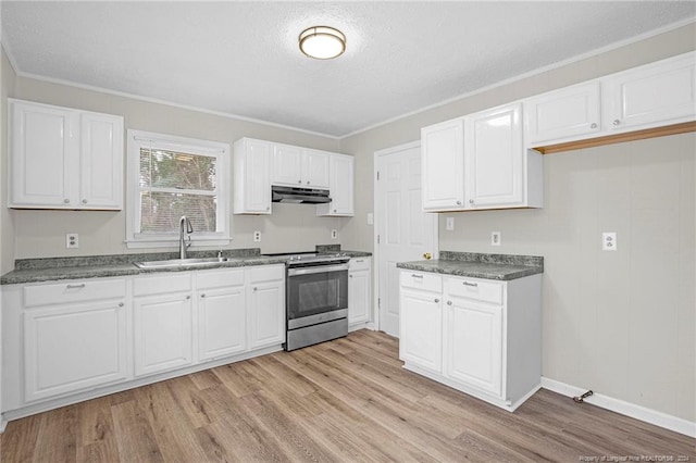 kitchen featuring sink, light hardwood / wood-style flooring, stainless steel electric range oven, a textured ceiling, and white cabinetry