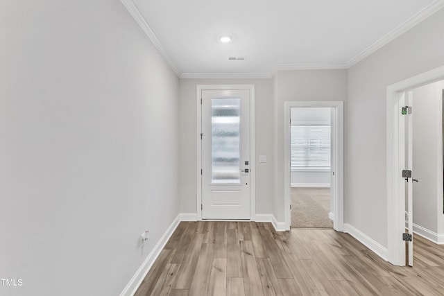 doorway to outside with light wood-type flooring and ornamental molding