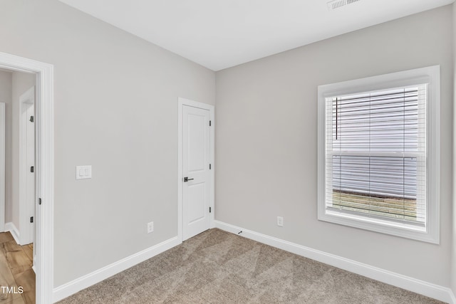 view of carpeted spare room