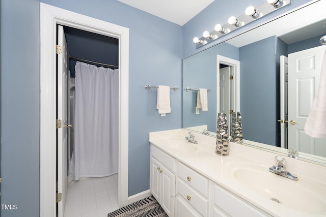 bathroom featuring vanity and tile patterned floors