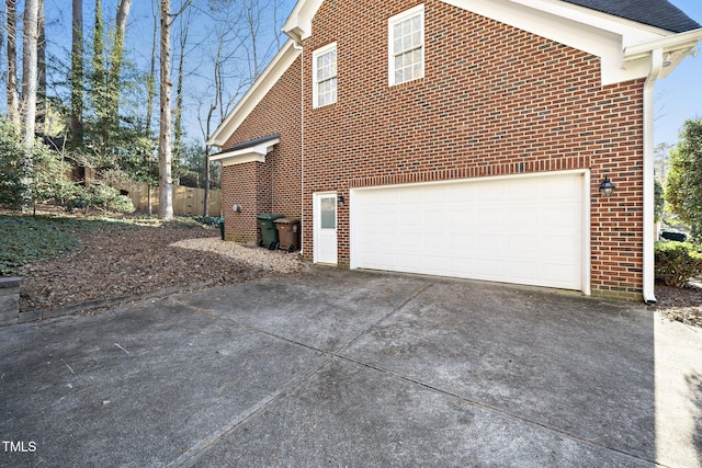 view of side of property featuring a garage