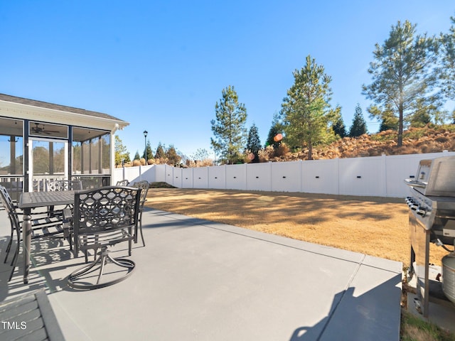 view of patio / terrace with a sunroom