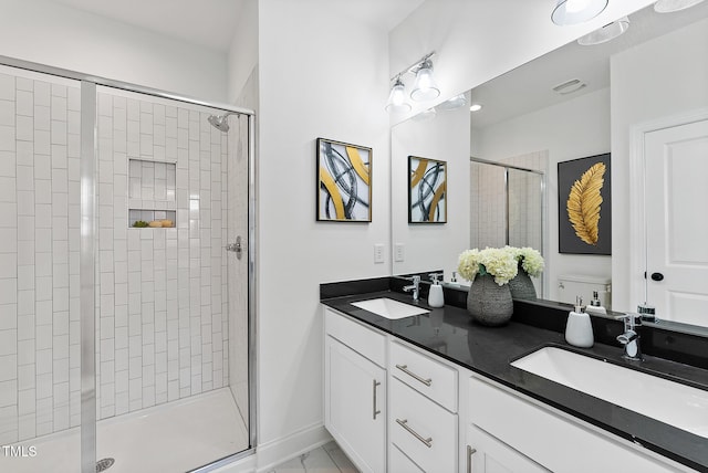 bathroom featuring vanity and walk in shower