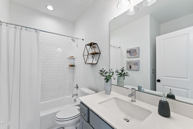 full bathroom with vanity, toilet, and shower / bath combo with shower curtain