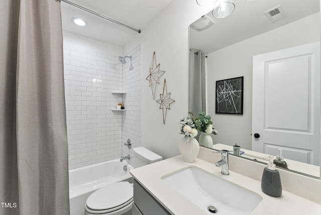 full bathroom with vanity, toilet, and shower / bath combo with shower curtain