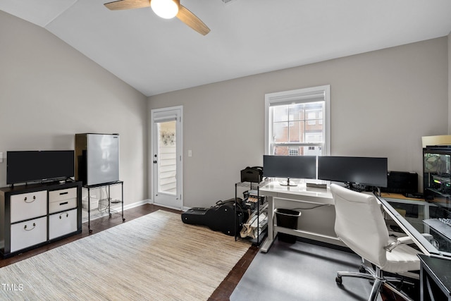 office space with hardwood / wood-style flooring, ceiling fan, and vaulted ceiling