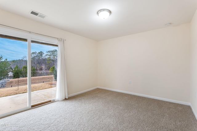 unfurnished room with carpet floors