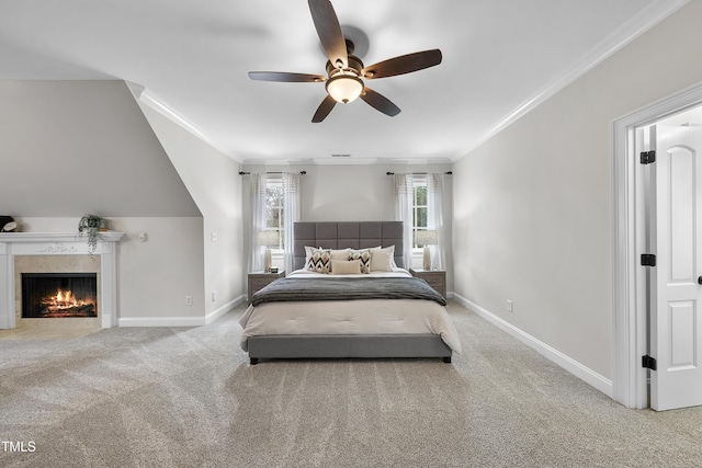 bedroom featuring ceiling fan, carpet floors, and crown molding