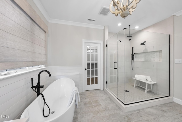 bathroom with crown molding, independent shower and bath, and an inviting chandelier