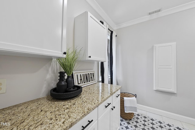 bathroom featuring vanity and crown molding