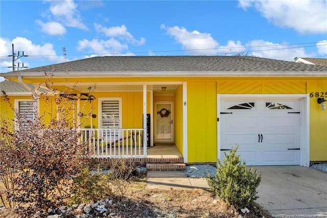 ranch-style house with a porch and a garage