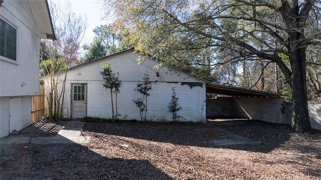 garage featuring a carport