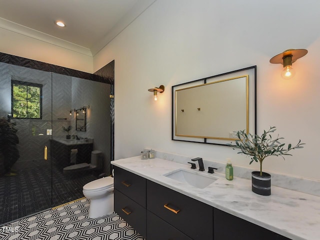 bathroom featuring vanity, tile patterned floors, crown molding, toilet, and a shower with shower door