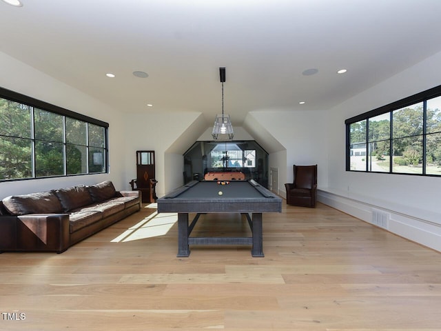 game room with light hardwood / wood-style floors and pool table