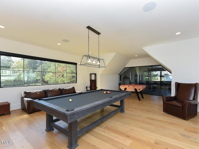 recreation room featuring vaulted ceiling, light hardwood / wood-style flooring, and pool table