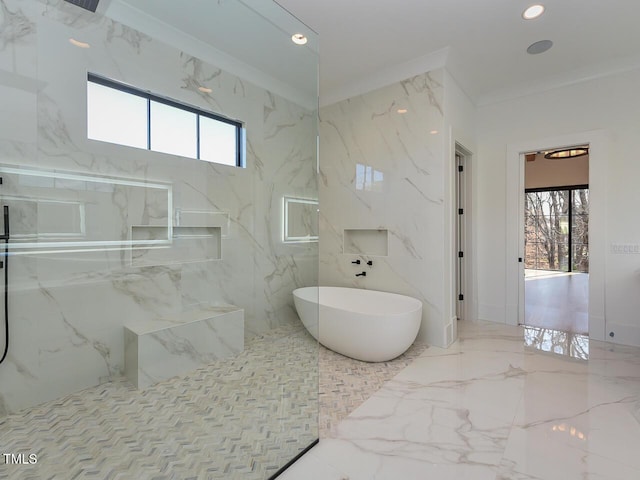 bathroom featuring a bathing tub and crown molding