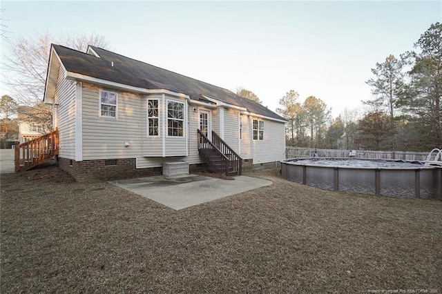 rear view of property with a patio area