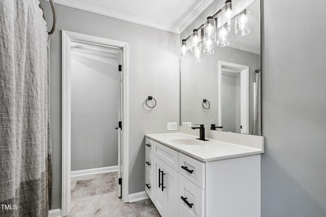 bathroom with vanity and ornamental molding