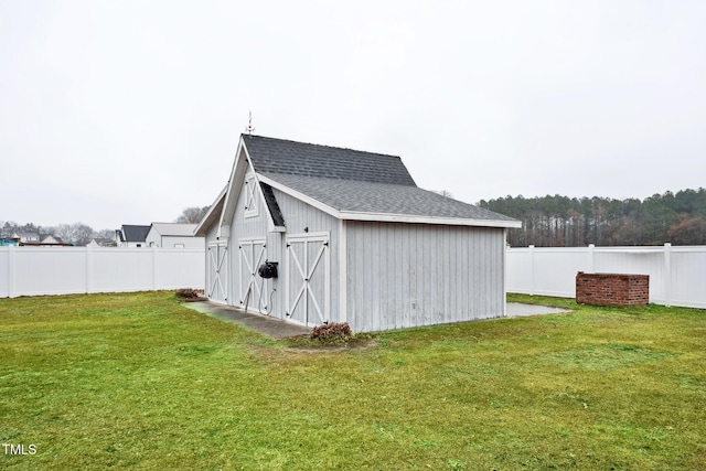 view of outdoor structure with a yard