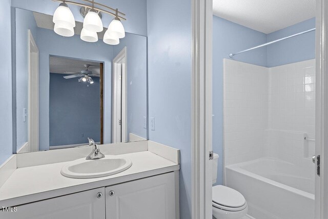 2248 Ventana Ln, Raleigh, NC 27604 - full bathroom with vanity, bathtub / shower combination, a ceiling fan, and a textured ceiling