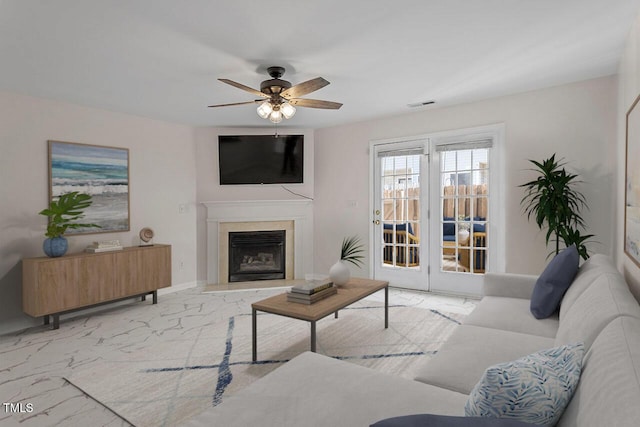 living room with light carpet and ceiling fan