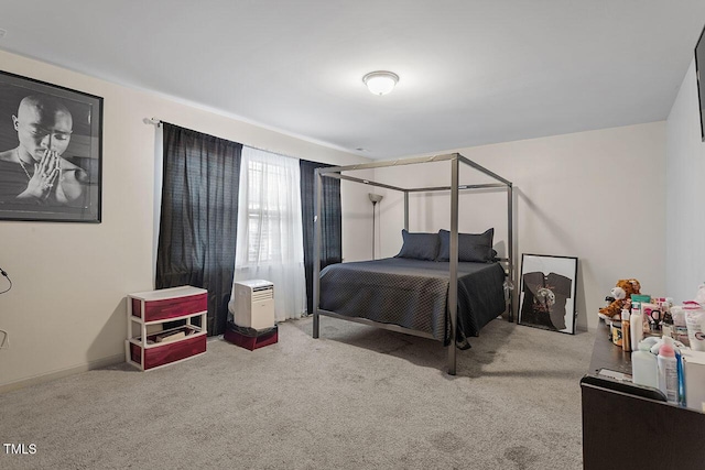 bedroom featuring light colored carpet