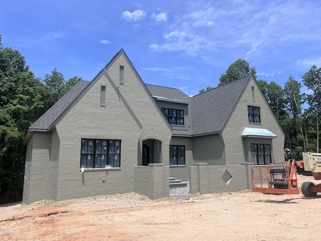 274 Westhampton Dr, Pittsboro, NC 27312 - view of front of home with brick siding and roof with shingles