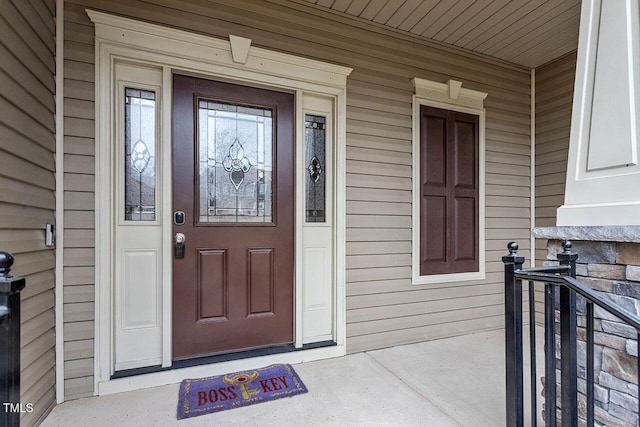 doorway to property with covered porch