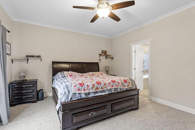 carpeted bedroom with ensuite bath, ceiling fan, and crown molding